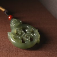 4弥勒佛公龙虎镂空吊坠(湖水）