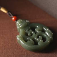 7弥勒佛公龙虎镂空吊坠（且末蓝）